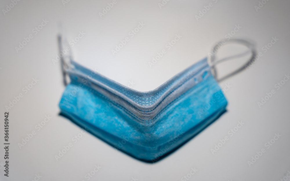 A mask lying on the table. Protection mask A mask lying on the table. Protection mask