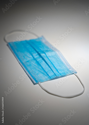A mask lying on the table. Protection mask