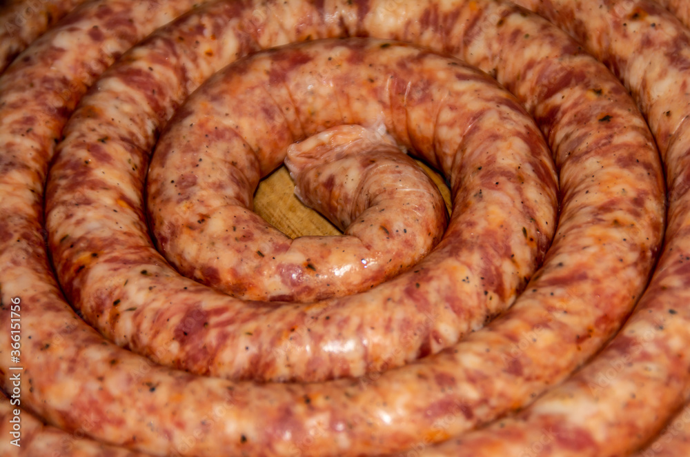 Fototapeta premium raw sausages with selective focus