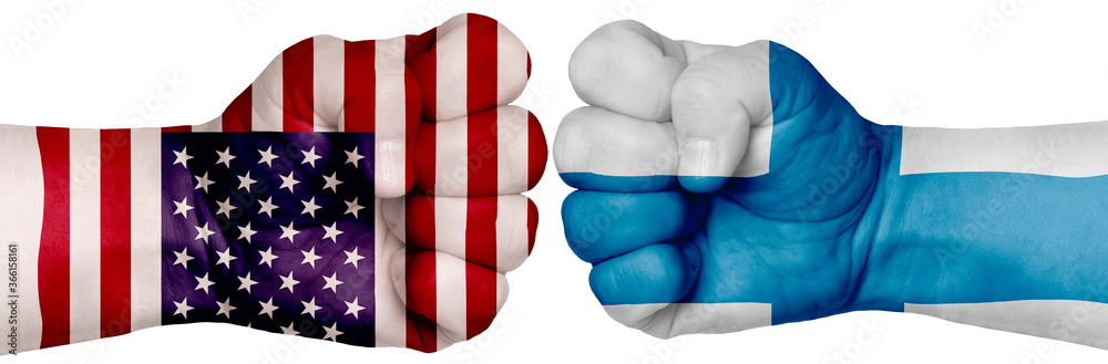 Fototapeta premium Two hands are clenched into fists and are located opposite each other. Hands painted in the colors of the flags of the countries. Finland vs USA
