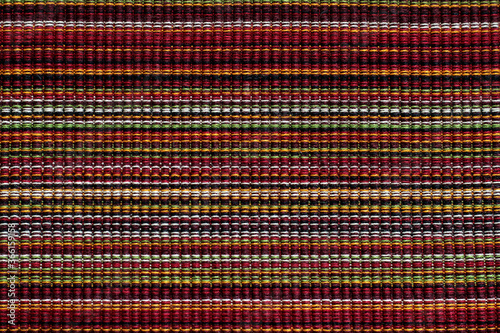 Line weave texture in shades of red, green, purple, pink, yellow