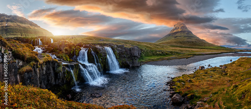 Scenic image of Iceland. Great view on famouse Mount Kirkjufell With Kirkjufell waterfall during sunset. Wonderful Nature landscape. Popular Travel destinations. Picture of wild area photo