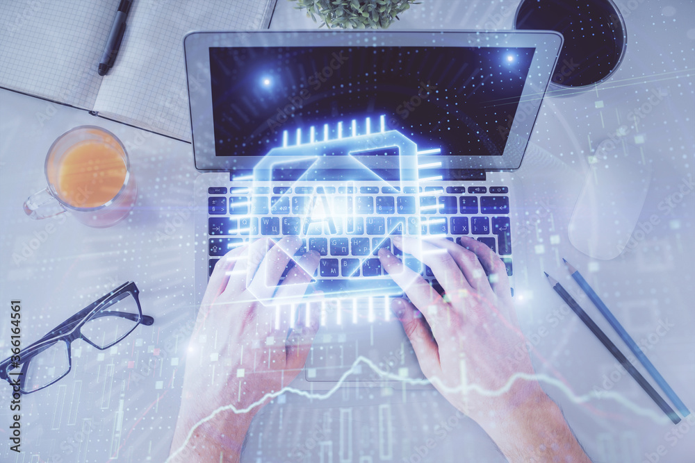 Multi exposure of man's hands typing over computer keyboard and data theme hologram drawing. Top view. Technology concept.