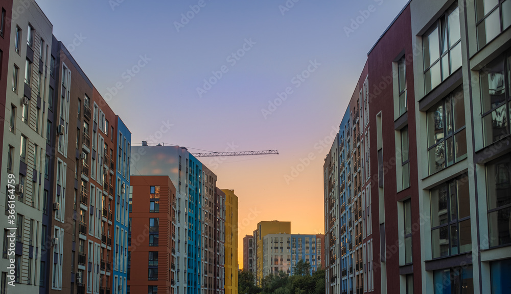 evening landmark urban view city scape apartment building street sunset lighting peaceful atmosphere
