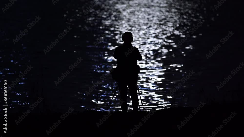 Photographer Takes Pictures Across a River Photographer Takes Pictures Across a River