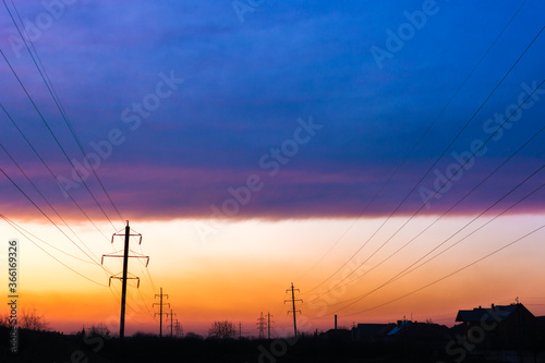 Natural Sunset. Bright Dramatic Sky And Dark Ground. Landscape Under Scenic Colorful Sky. Sun Over Skyline, Horizon. Transcarpathia and Uzhhorod. Magic Sunset. Dusk. Clouds.