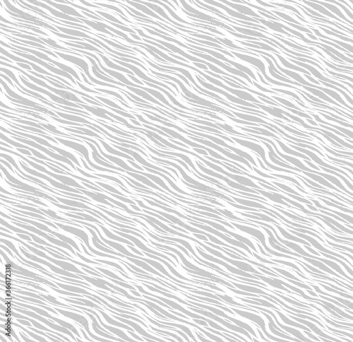 Scratchy wavy hand drawn lines in a seamless repeat pattern background