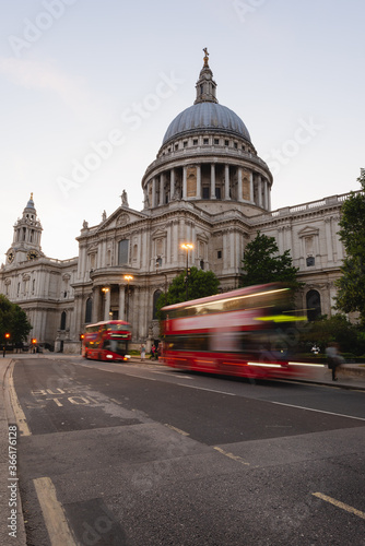 facade of St Pauls Cathedral with red London bus © Mark