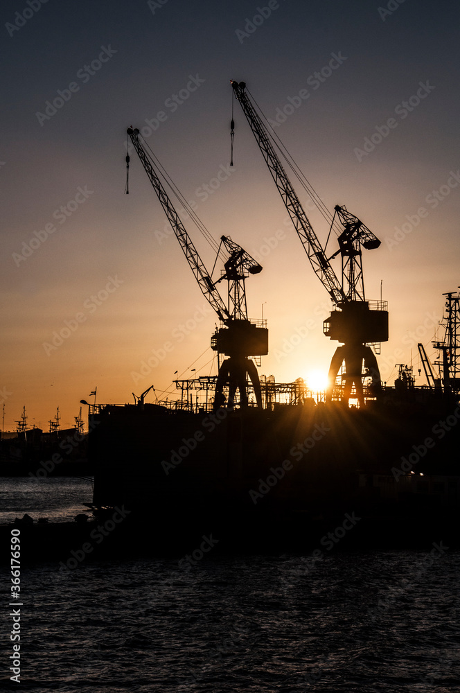 cranes at sunset in the Port of Mar del Plata