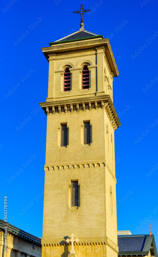 The bell tower of CHRIST CHURCH in Brunswick, Melbourne, Australia at the golden hour sunset