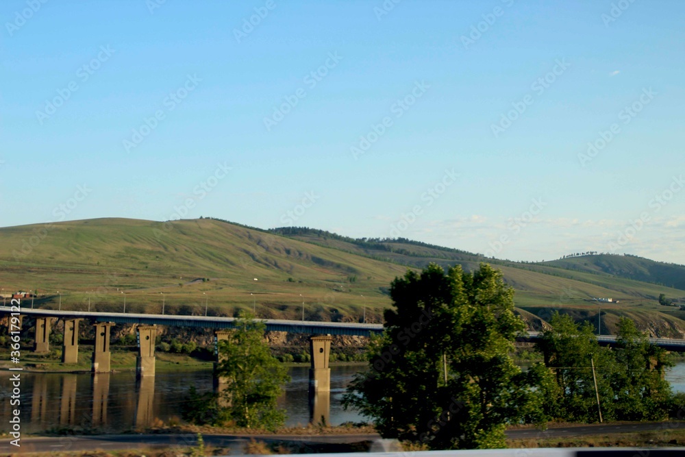 sunlit bridge over the Shilka river in Transbaikalia
