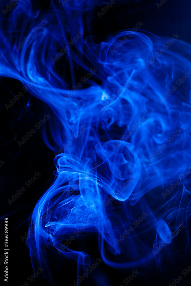 Fototapeta premium Blue smoke motion on black background.