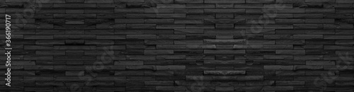 panorama black brick wall of dark stone texture and background ,paranomic stone floor wide picture              .