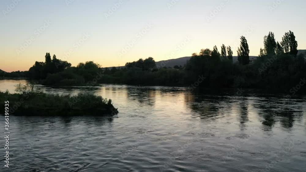 river base drone shoot. Turkey Kizilirmak (RedRiver) throughout the camera is moving. river and trees on the edge. in Cappadocia river base drone shoot. Turkey Kizilirmak (RedRiver) throughout the camera is moving. river and trees on the edge. in Cappadocia