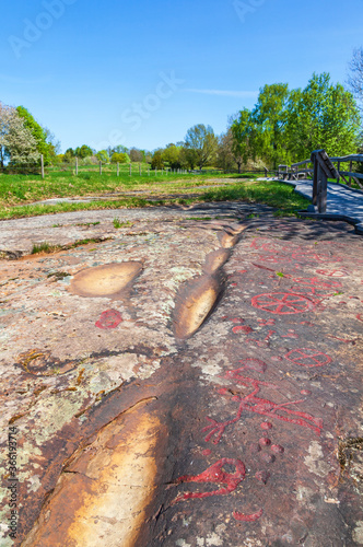 Old rock carvings in Flyhov at Sweden from ancient times photo