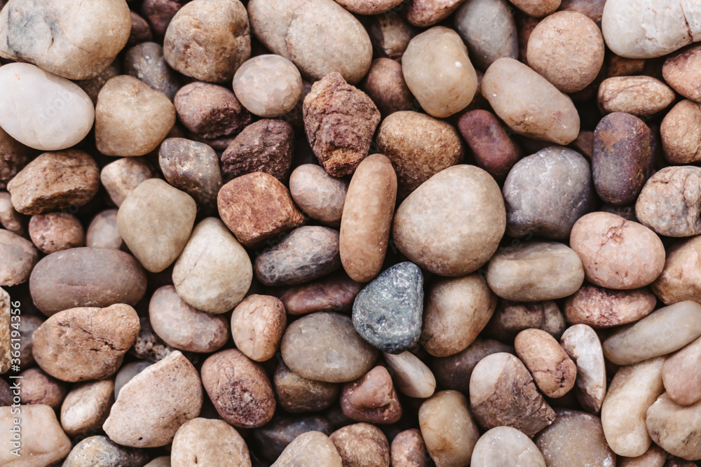 Background pattern and texture of a gravel or pebbles stone Background pattern and texture of a gravel or pebbles stone