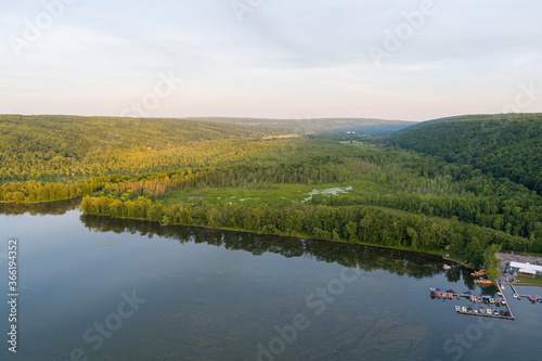 Photography Late afternoon sun shines on Owasco Lake and Owasco Inlet near Moravia, Cayuga County, New York