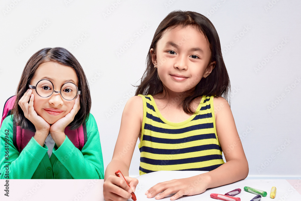 Asian little girl studying together in the classroom Asian little girl studying together in the classroom