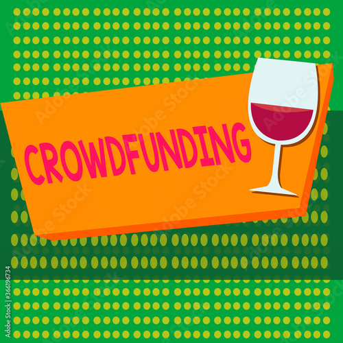 Writing note showing Crowdfunding. Business concept for project by raising a large number of small amounts of money Halftone Goblet Glassware filled with Wine Rectangular Form photo