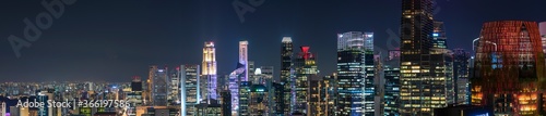 Wide panorama image of Singapore skyscrapers at night © hit1912