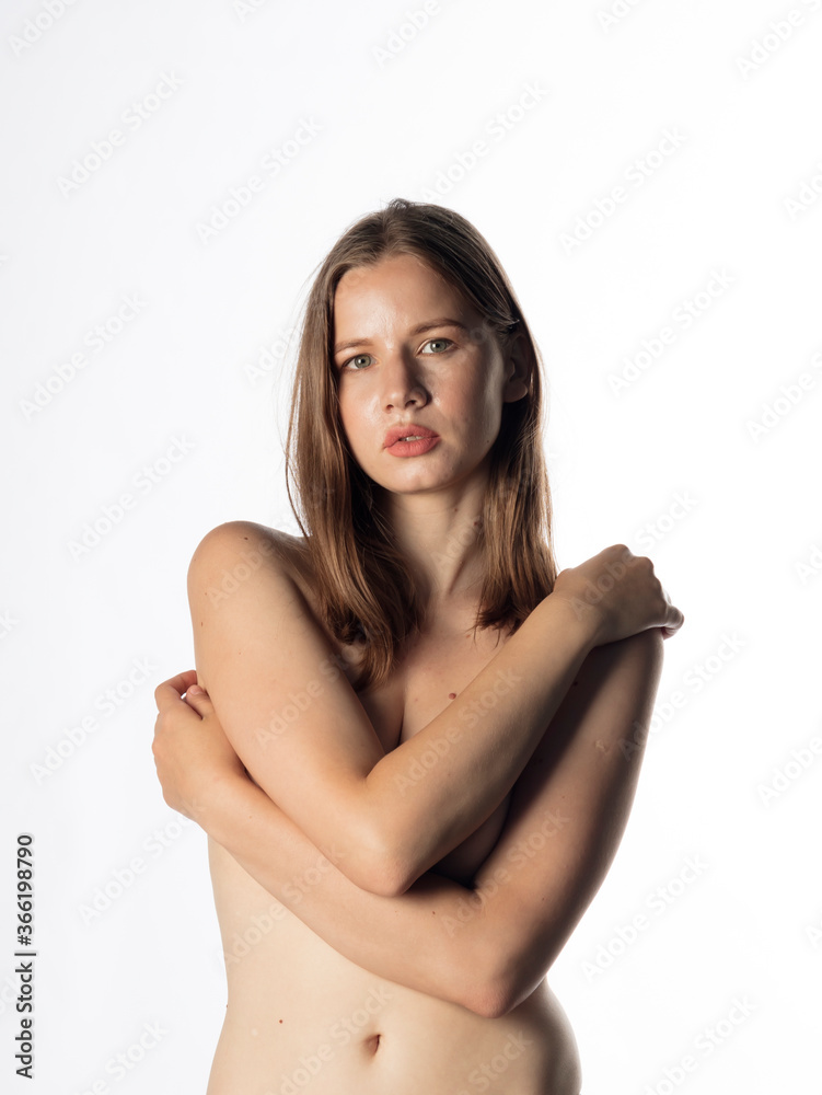 Fototapeta premium photo of a naked girl, topless, studio shooting