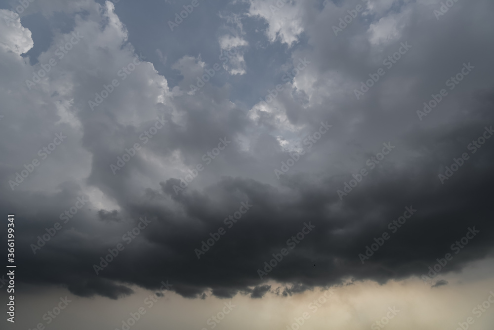 dark storm clouds with background,Dark clouds before a thunder-storm. dark storm clouds with background,Dark clouds before a thunder-storm.