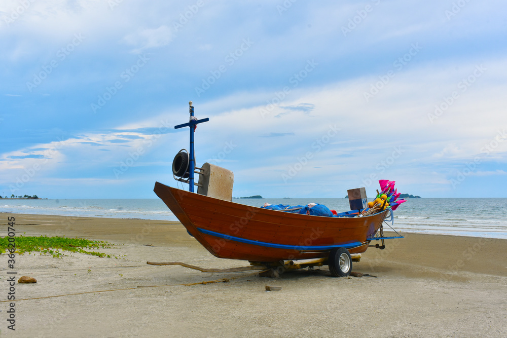 
The fishing boat is parked
Seashore