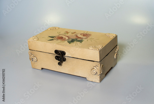 small carved box with old coins photo