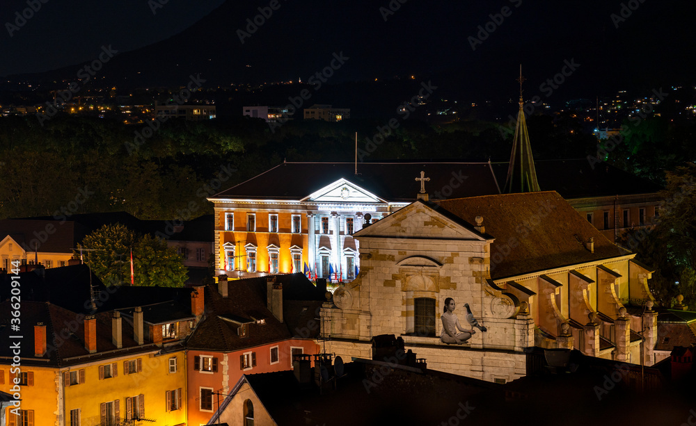 The night view of medieval insular palace Palais de l'Ile jail in Annecy, France