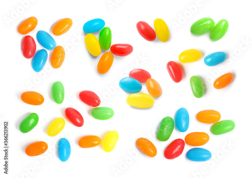 Fototapeta Naklejka Na Ścianę i Meble -  Set with delicious color jelly beans on white background, top view
