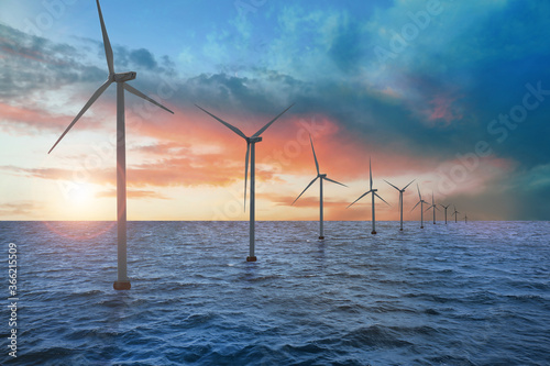 Fototapeta Floating wind turbines installed in sea