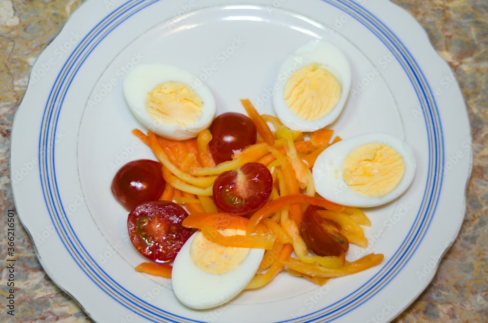 simple food on a light plate - vegetables, bell peppers and eggs simple food on a light plate - vegetables, bell peppers and eggs