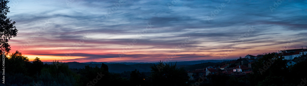 Panoramic colorful sunset from the countryside