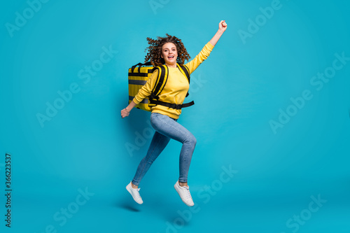 Full length body size view of nice attractive cheerful motivated wavy-haired girl jumping carrying package cafe fresh meal isolated over bright vivid shine vibrant blue color background