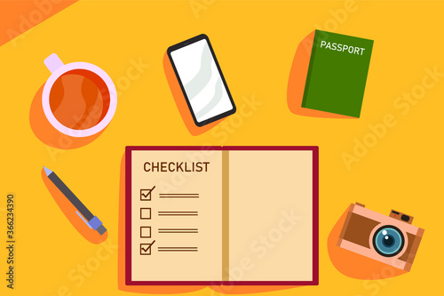 Traveling vector concept: top down view of travel packing list on the orange table