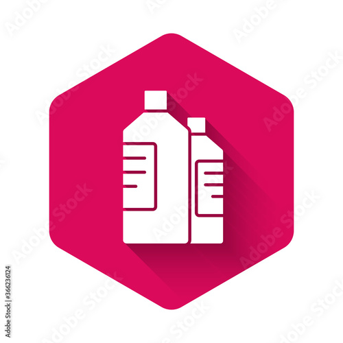 White Plastic bottles for laundry detergent, bleach, dishwashing liquid or another cleaning agent icon isolated with long shadow. Pink hexagon button. Vector Illustration.