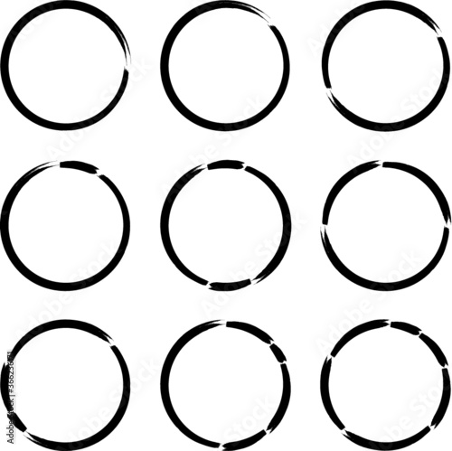 Set of Grunge Black and White Circle Frames . Vector
