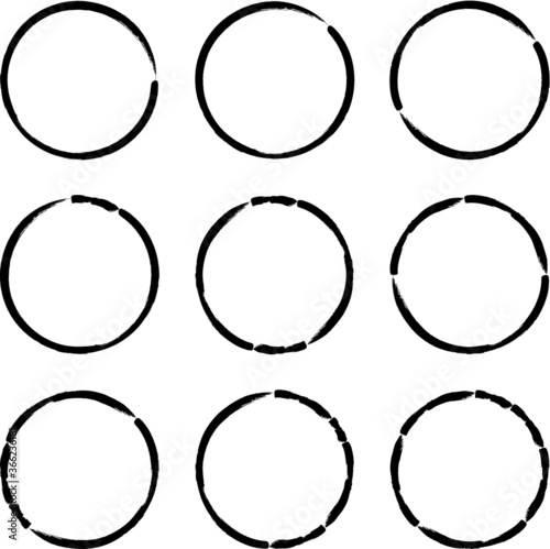 Set of Grunge Black and White Circle Frames . Vector