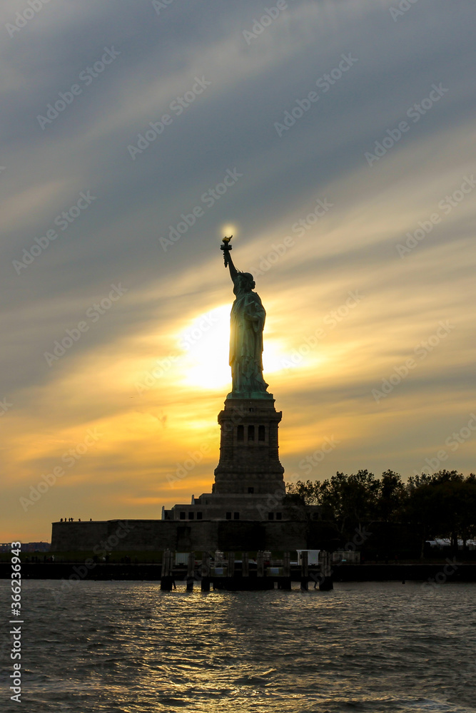 statue of liberty at sunset