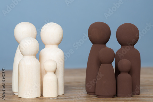 Bilde på lerret A white and black family integrating and being friends together in a racial harm