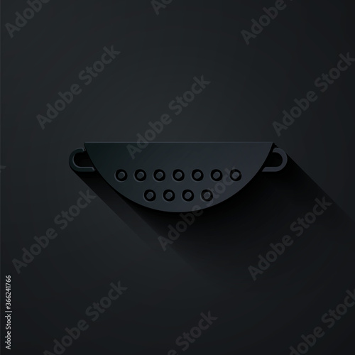 Paper cut Kitchen colander icon isolated on black background. Cooking utensil. Cutlery sign. Paper art style. Vector Illustration.