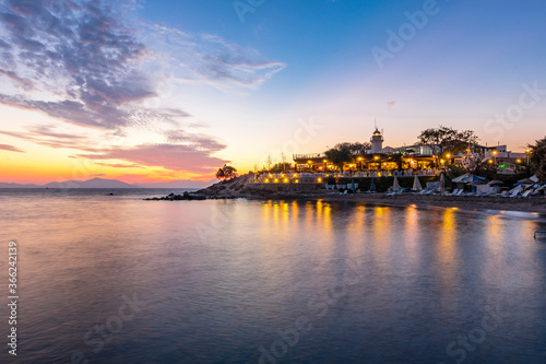 Fototapeta Naklejka Na Ścianę i Meble -  Huseyinburnu lighthouse night view in Turgutreis Town in Turkey.