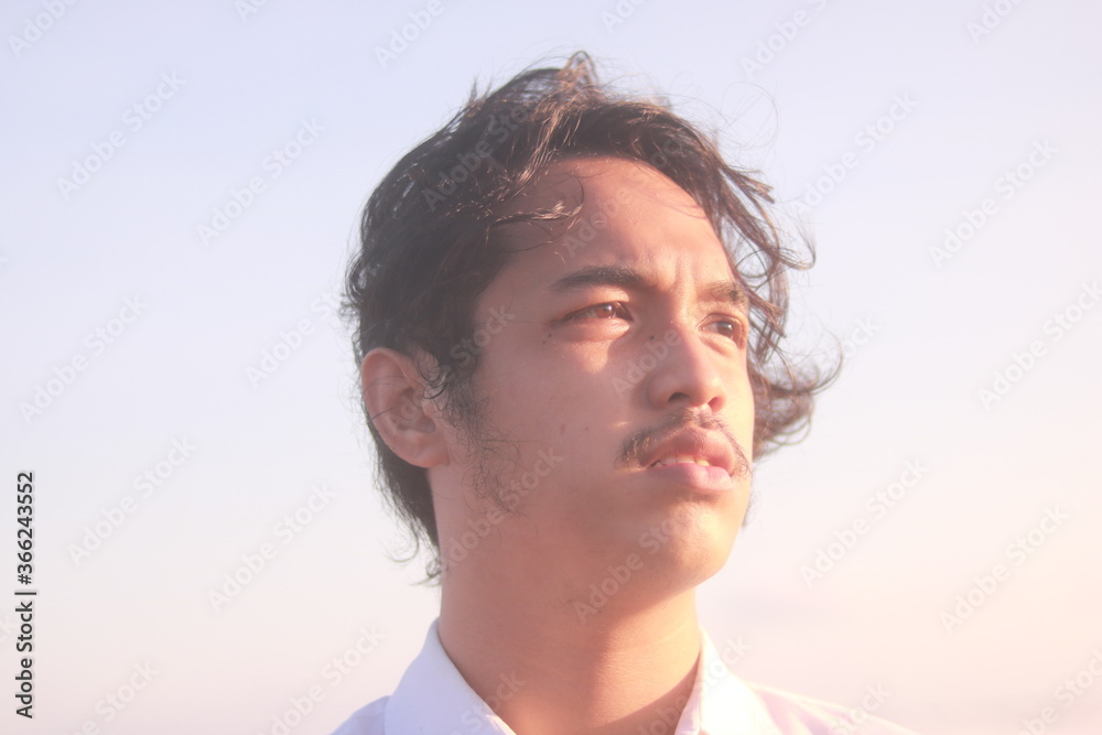 portrait of handsome man on the beach