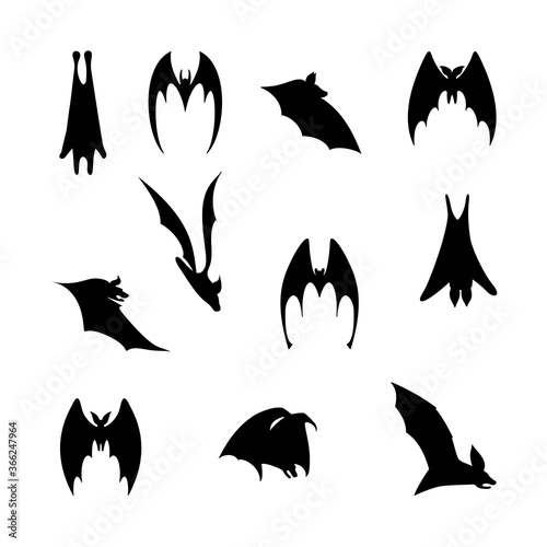 vector illustration of bats in flight. Black flittermouse silhouette. Set of bats in different shapes