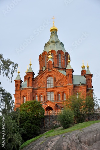 Red brick building of Uspensky Cathedral in Helsinki, Finland photo