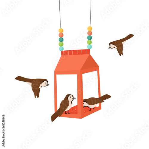 Carton bird feeder. Handmade street house for feeding birds from milk or juice package. Zero waste, upcycling craft ideas, reuse of utilized. Colourful vector illustration isolated on white background