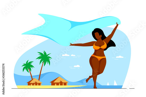 Body positive, plus size woman enjoys summer at the beach