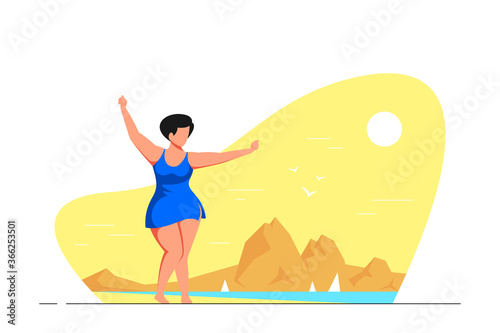 Attractive woman plus size dancing on the beach
