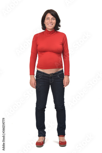 front view of full portrait of a pregnant woman with casual clothes on white background, photo