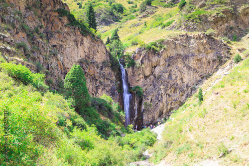 Kegeti waterfall. Background for tourism and travel. Summer landscape. Kegeti Gorge, Kyrgyzstan. photo